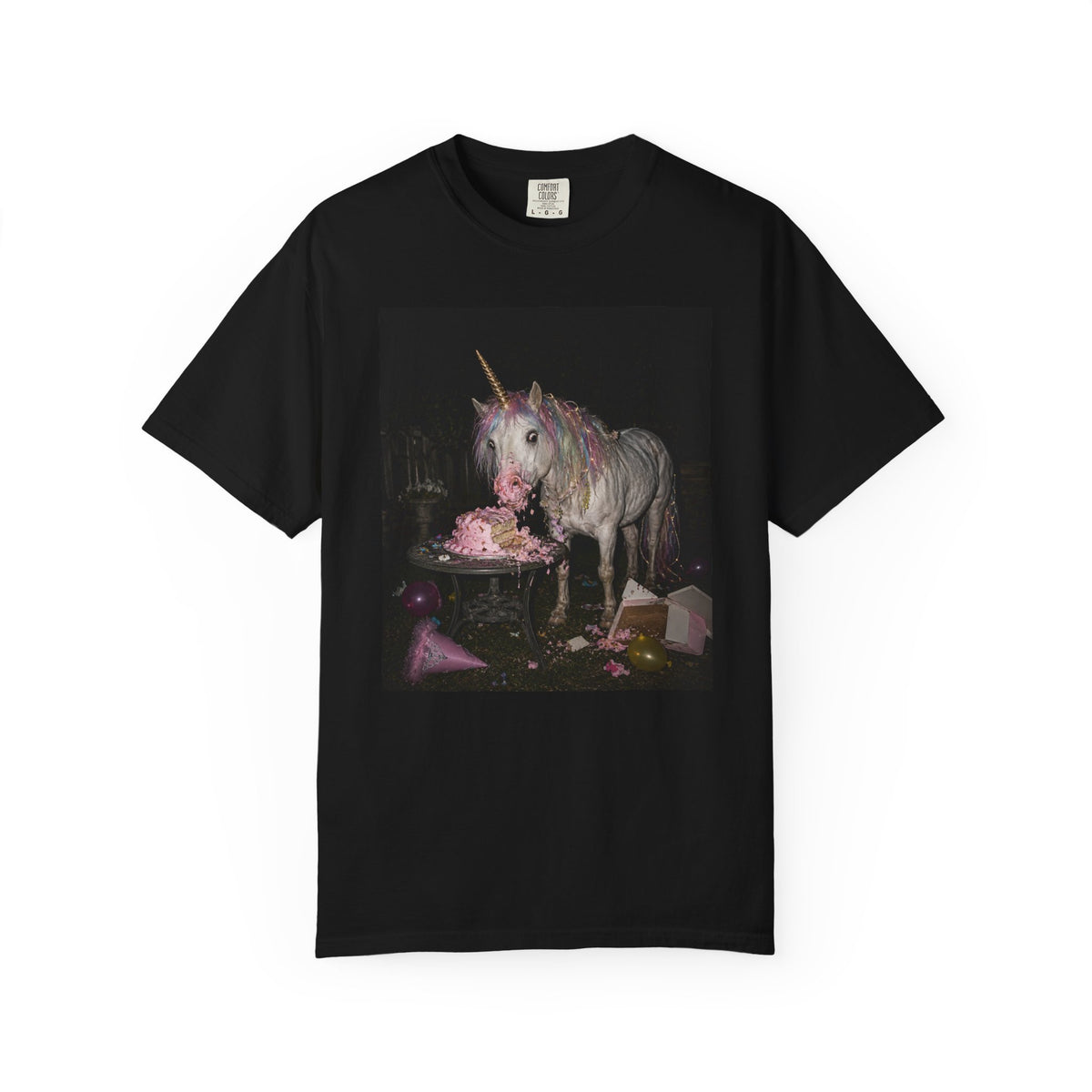 Black graphic t-shirt with a retro-style photo of a unicorn stealing pink birthday cake at a dark party scene, shown on a white background.