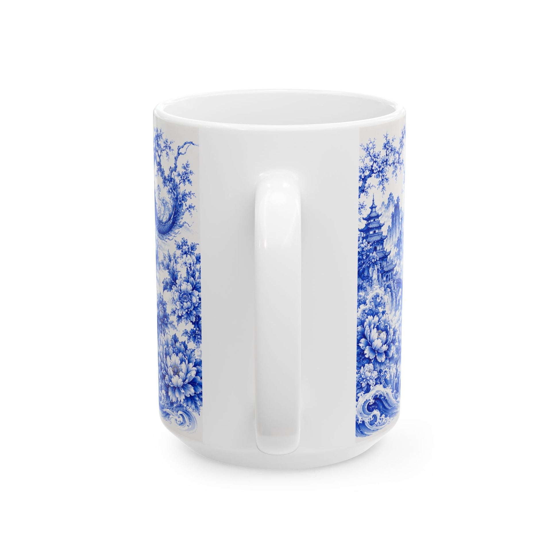 Handle side of white mug with blue dragon, waves, mountains and floral design on a white background